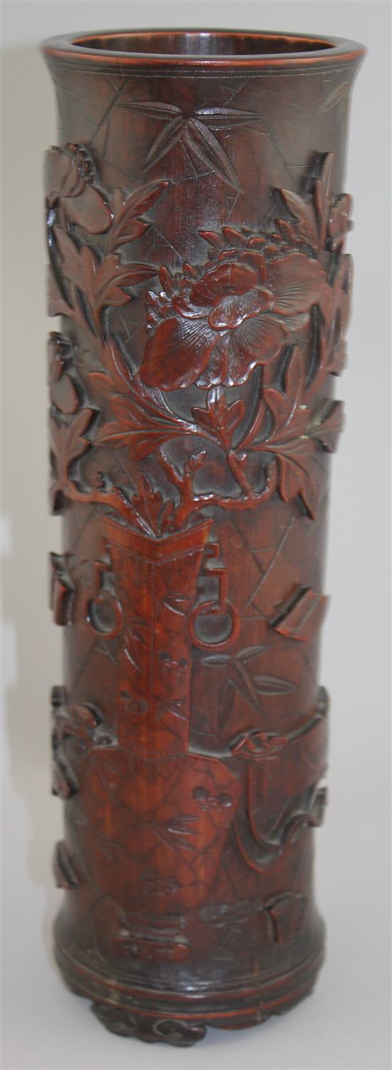 A Chinese bamboo hundred antiques cylindrical brush pot, 19th century, 34cm